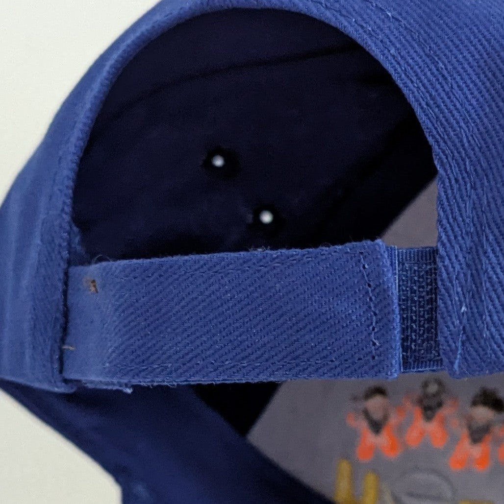 Close up of the back of the cap, which features a velcro adjustment