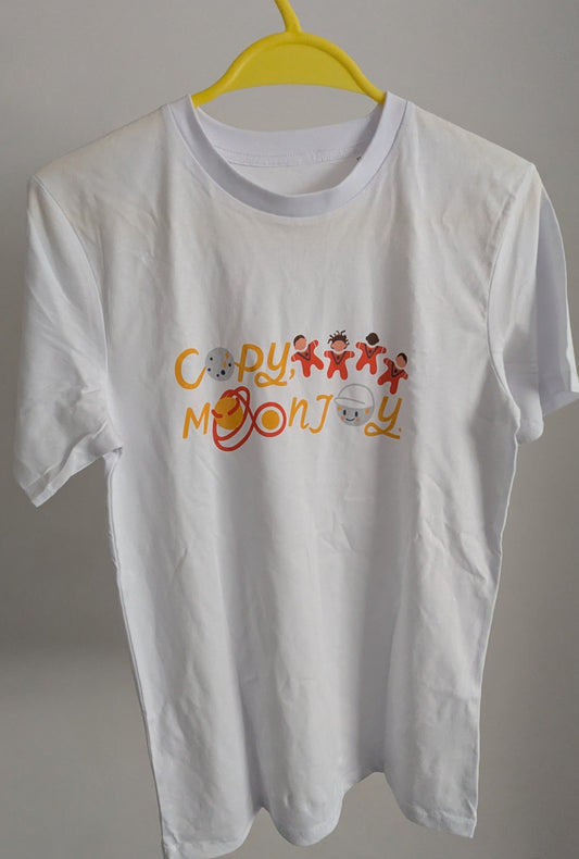 White t-shirt with colourful graphics and text saying 'copy, moon joy' . This is an kids t-shirt sized 12-13 years.